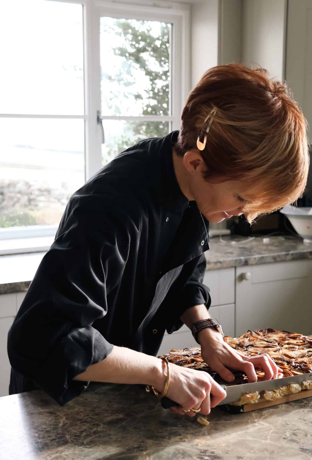 Polly in the Winstone kitchen preparing food for events